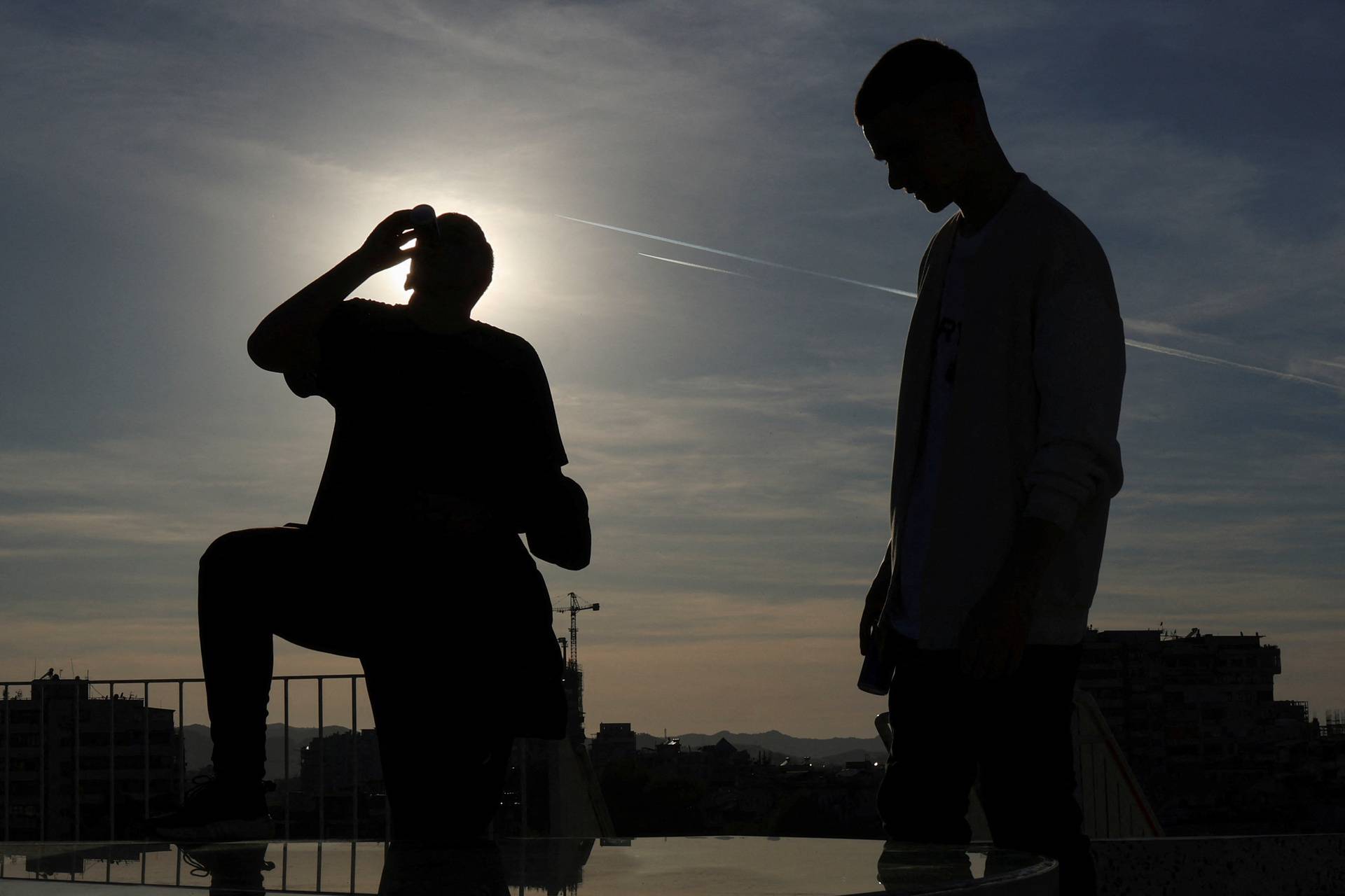 People enjoy the sun as temperatures are rising in Tirana