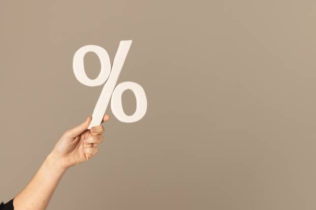 Video,Of,Hand,Of,Caucasian,Woman,Holding,White,Percent,Sign