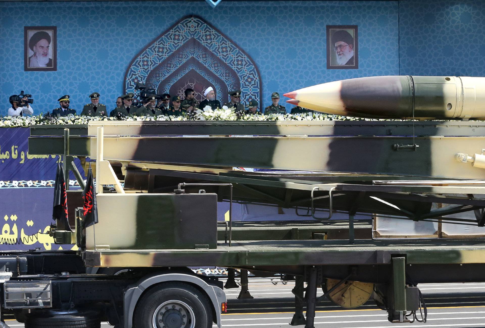 Missiles are displayed as Iranian President Hassan Rouhani attends an armed forces parade in Tehran