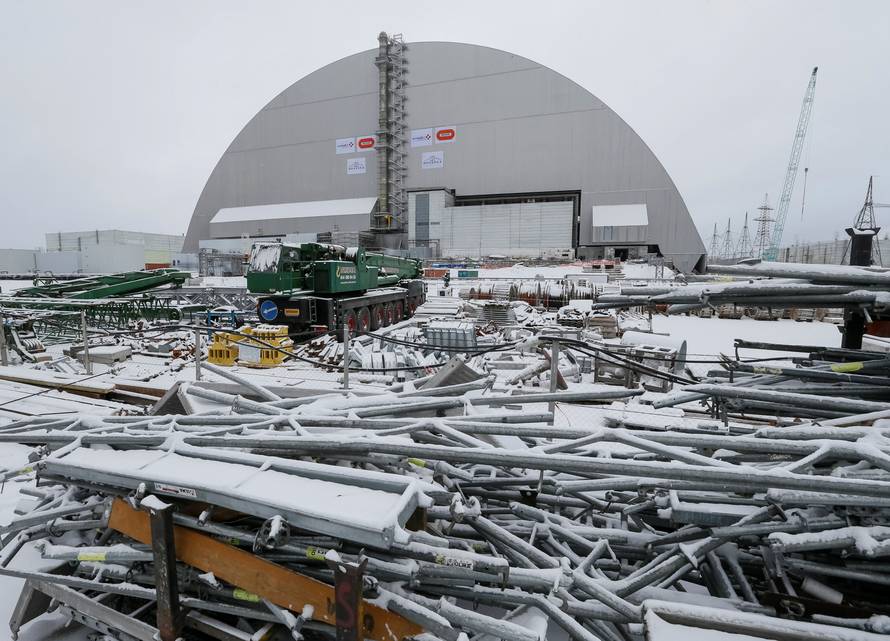 A general view shows a New Safe Confinement (NSC) structure over the old sarcophagus covering the damaged fourth reactor at the Chernobyl nuclear power plant, in Chernobyl