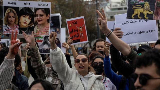 Members of the Iranian community living in Turkey attend a protest in support of Iranian women in Istanbul