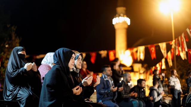 People pray on the first day of the fasting month of Ramadan in Istanbul