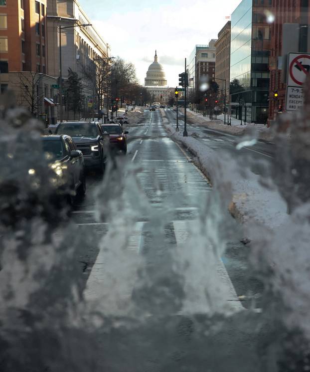 People deal with the aftermath of a major winter storm across a large swath of the United States
