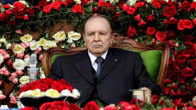 FILE PHOTO: Algeria's President and head of the Armed Forces Abdelaziz Bouteflika attends a graduation ceremony of the 40th class of the new army officers at a Military Academy