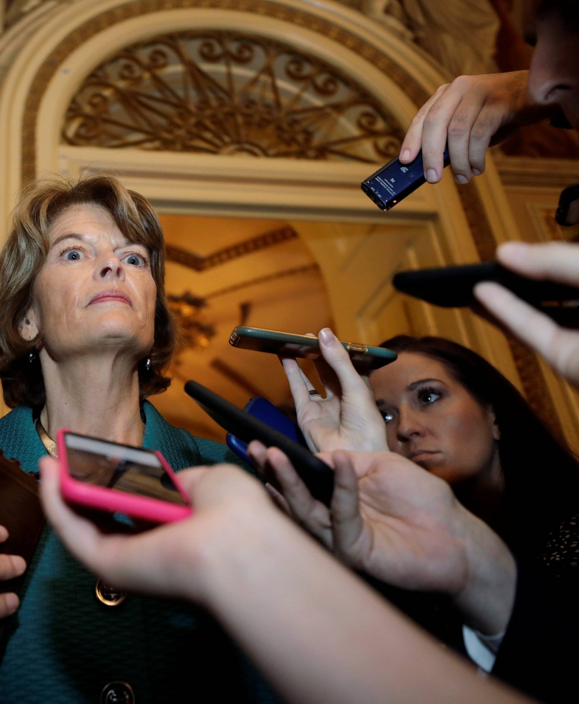 U.S. Senator Murkowski talks to reporters about her no vote on Kavanaugh nomination vote on Capitol Hill in Washington