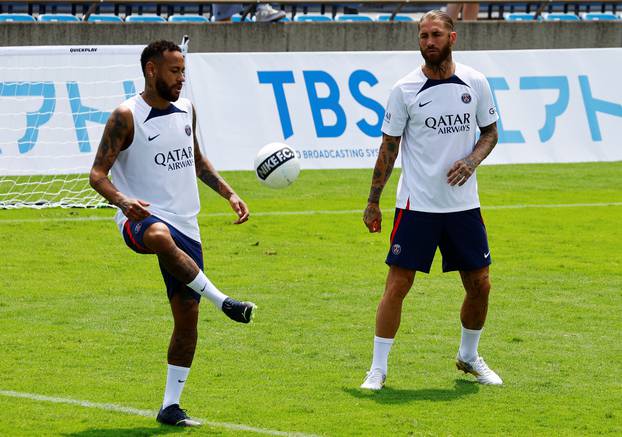 Paris St Germain's players at a kids soccer clinic during the team's tour of Japan, in Tokyo