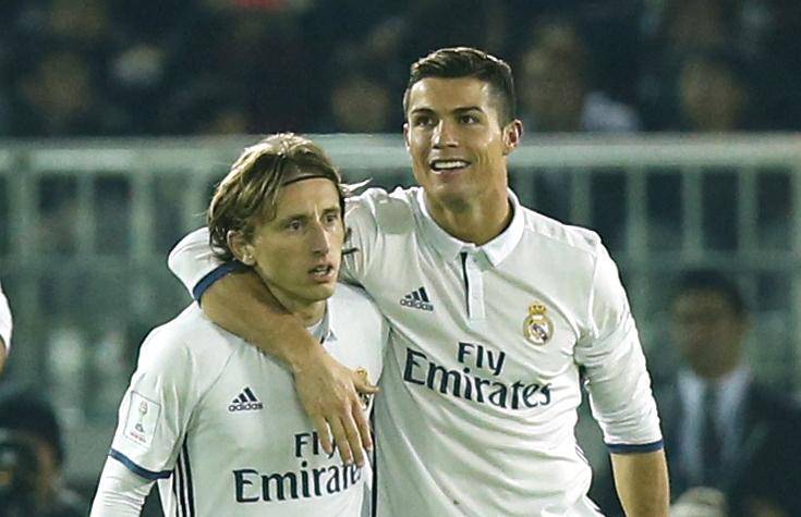Real Madrid's Cristiano Ronaldo celebrates scoring their fourth goal with Luka Modric