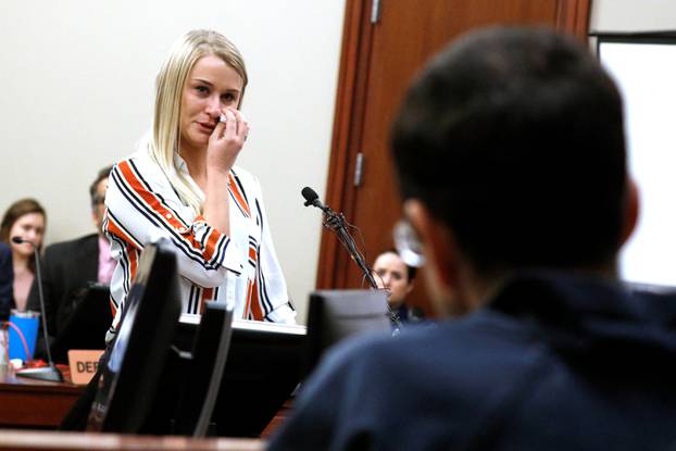 Victim Christine Harrison speaks at the sentencing hearing for Larry Nassar, a former team USA Gymnastics doctor who pleaded guilty in November 2017 to sexual assault charges, in Lansing