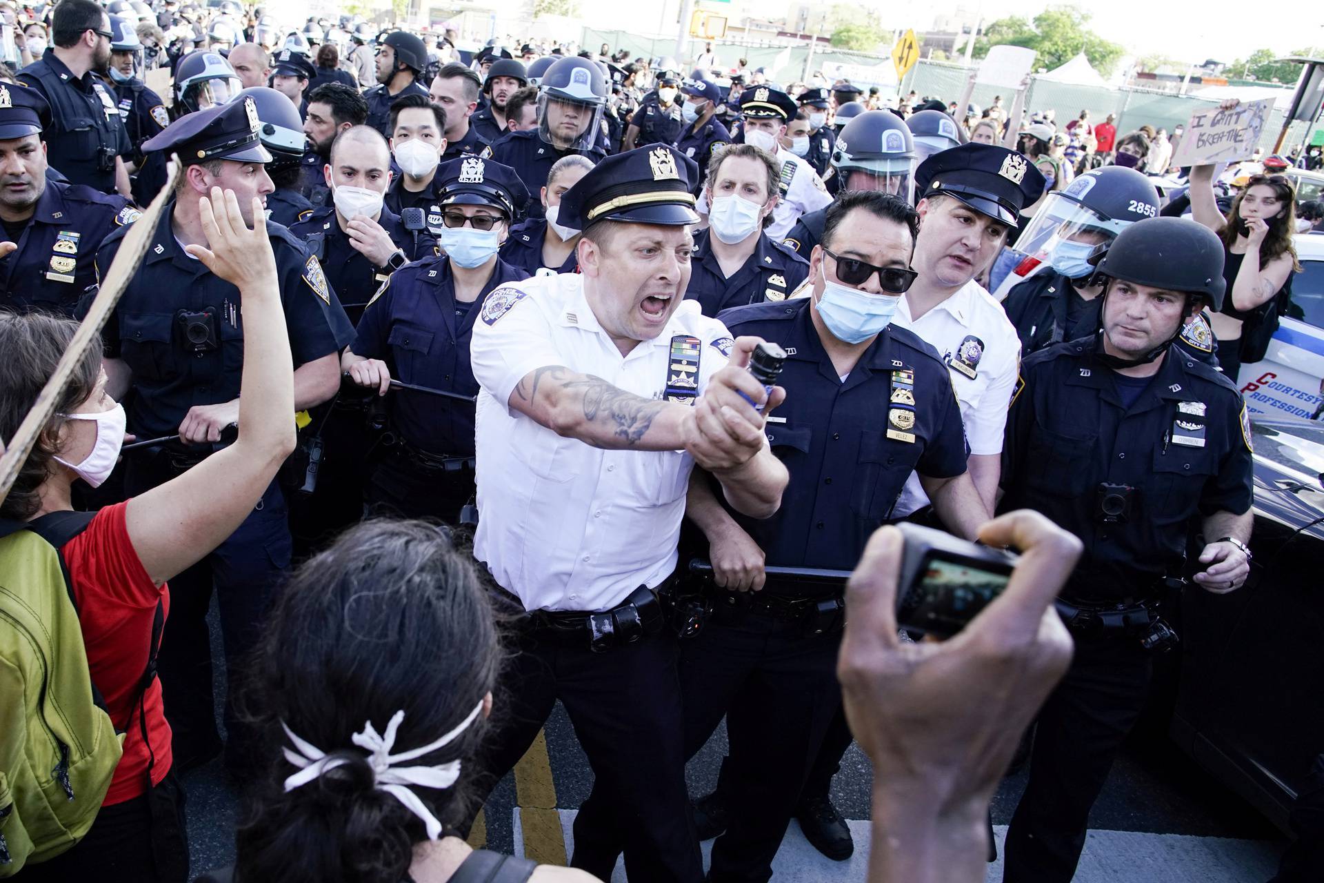 Protesters rally against the death in Minneapolis police custody of Floyd, in the Brooklyn borough of New York City