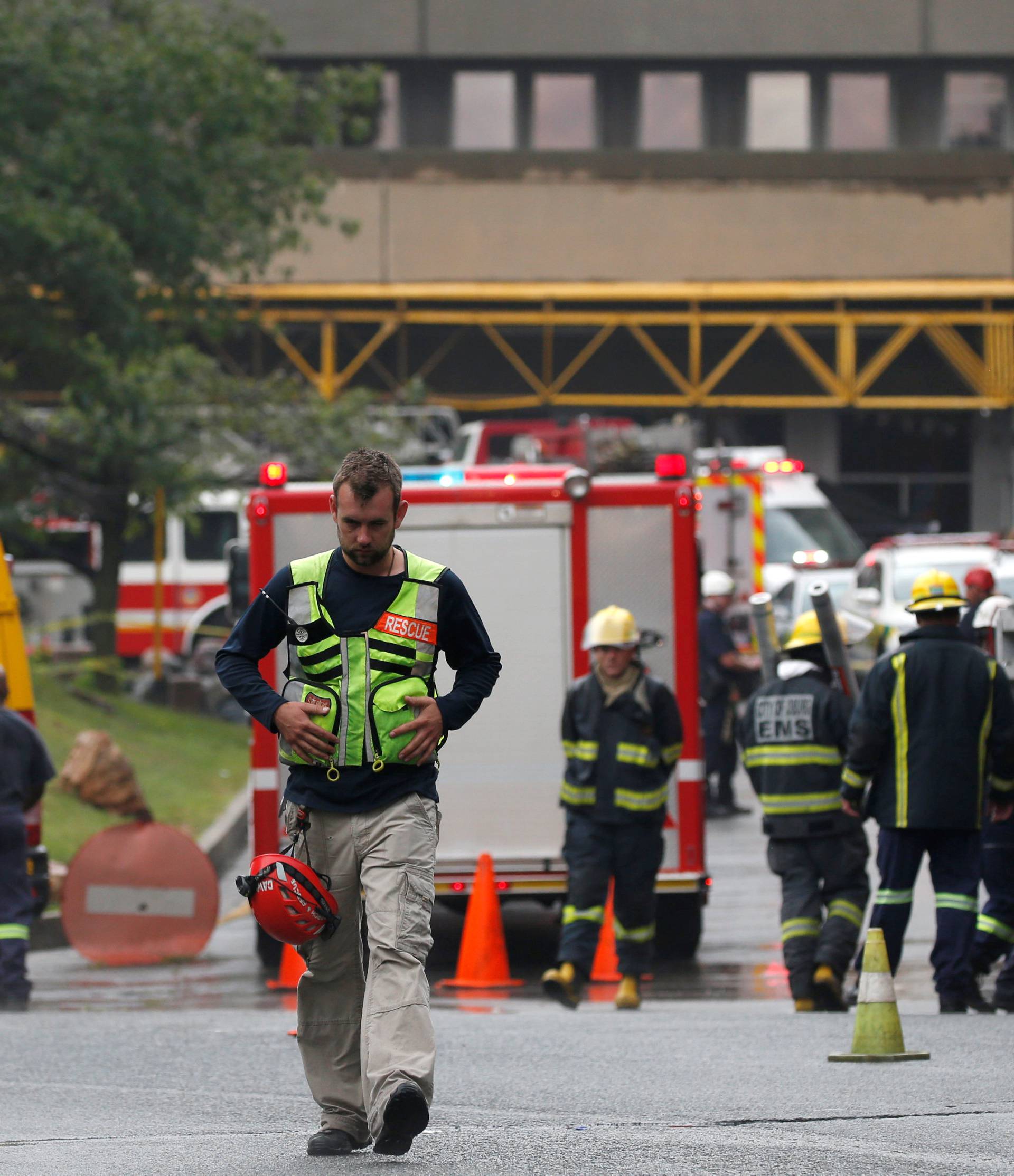 An emergency worker is seen after a roof collapsed at Johannesburg's Charlotte Maxeke state hospital in Johannesburg