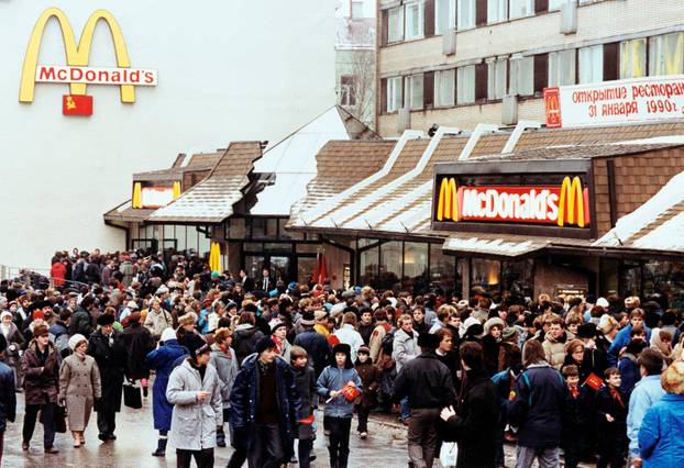 FILE PHOTO: Hundreds of Soviet patrons queue outside the first McDonald's restaurant in Moscow