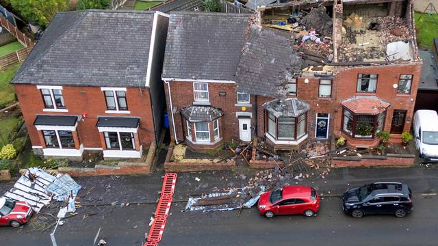 Damage is seen on the roofs of a row of terraced house after Storm Gerrit hit the country in Stalybridge