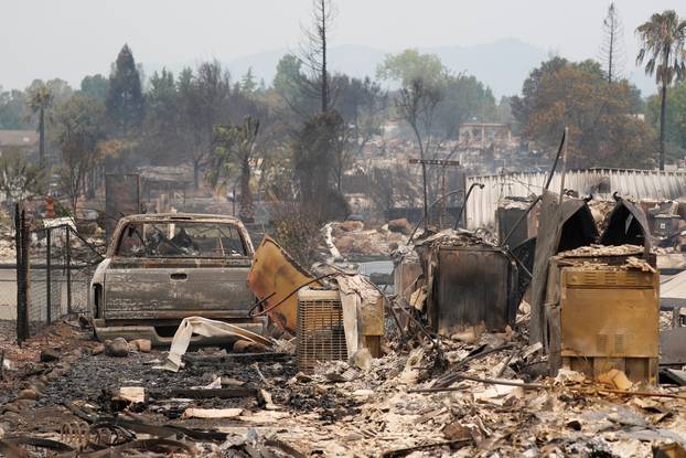 A charred neighborhood destroyed by the Carr Fire is seen west of Redding, California