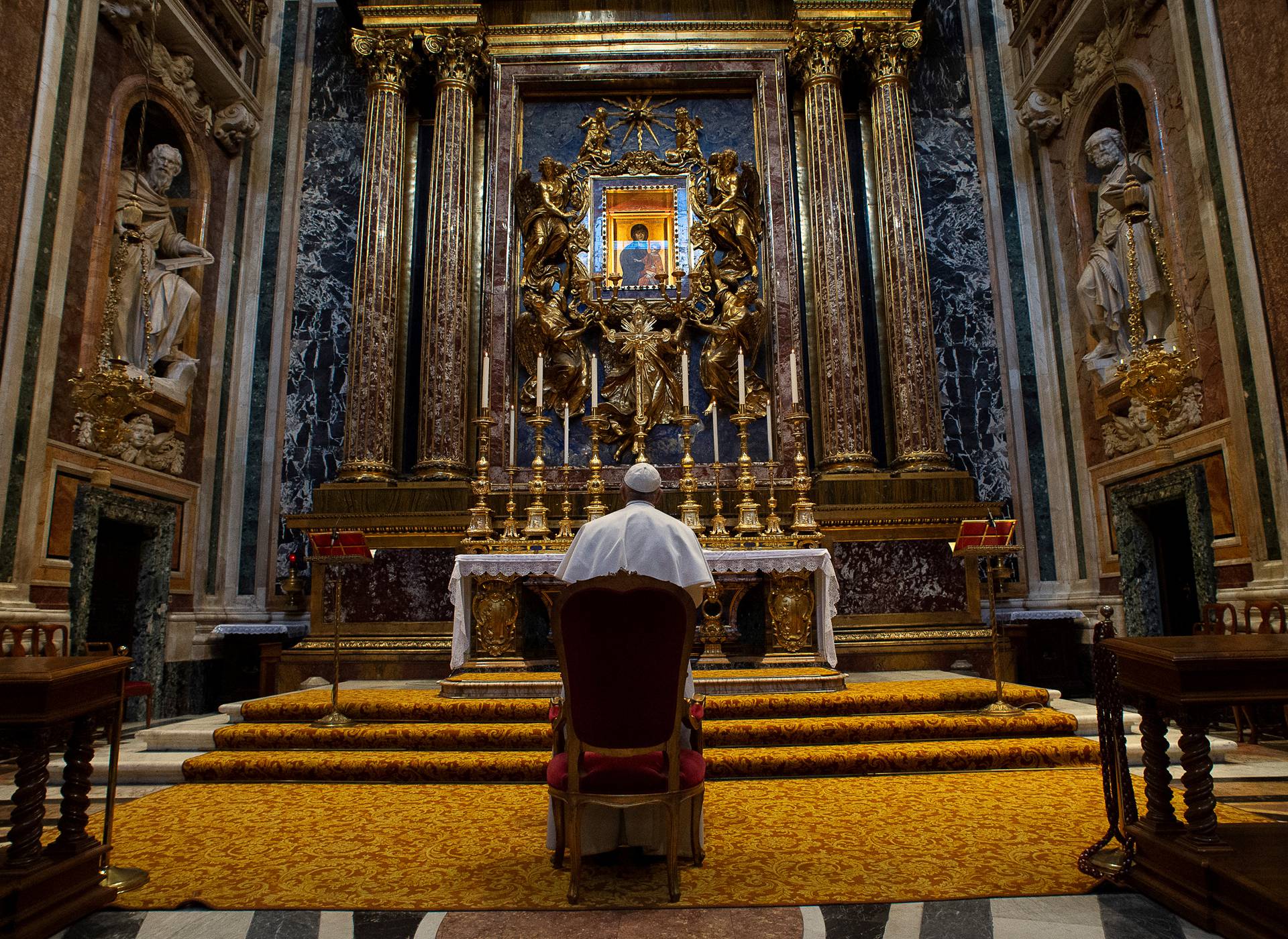 Pope Francis prays at the Santa Maria Maggiore basilica for the end of the coronavirus pandemic, in Rome