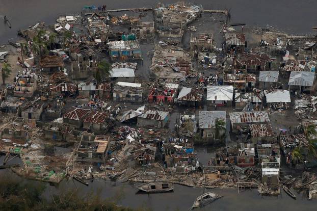 Destroyed houses are seen in a village after Hurricane Matthew passes Corail