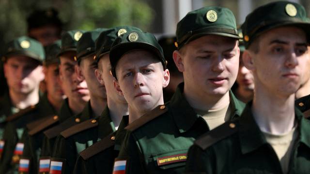 FILE PHOTO: Russian conscripts depart for garrisons from a recruitment centre in Simferopol