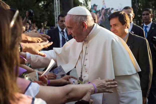 Pope Francis greets faithful at the San Alberto Hurtado shrine, in Santiago