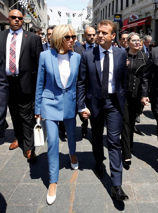French President Emmanuel Macron and his wife Brigitte Macron tour Old Montreal in Montreal