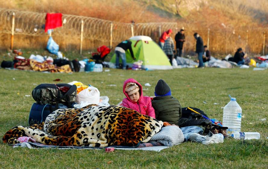 Migrant children are seen near Turkey's Pazarkule border crossing with Greece's Kastanies, near Edirne