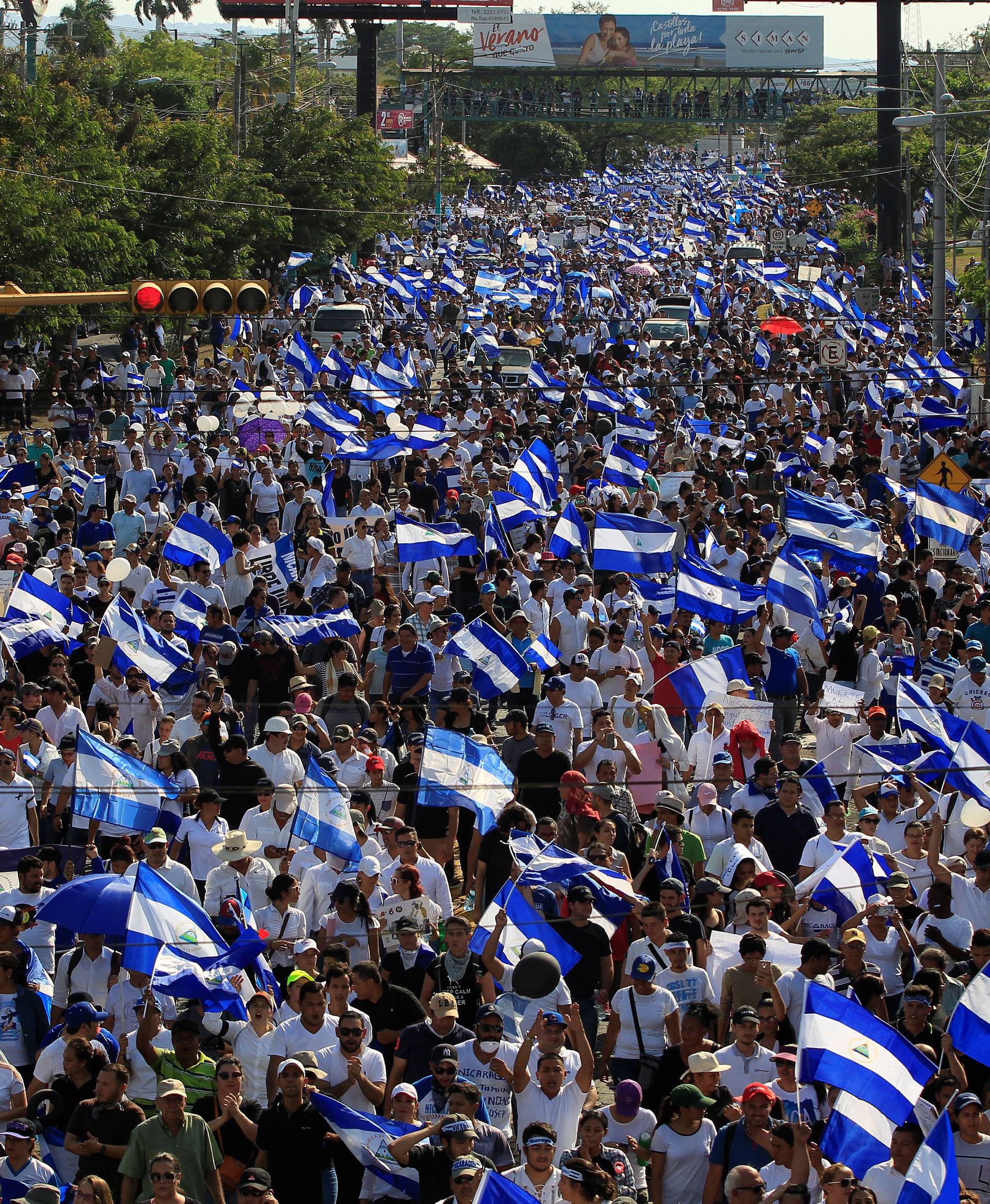 Demonstrators protest against police violence and the government of Nicaraguan President Daniel Ortega in Managua