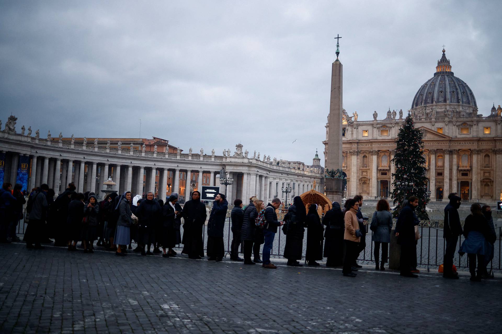 Faithful pay homage to former Pope Benedict in St. Peter's Basilica at the Vatican