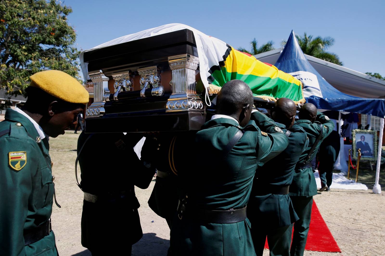 Coffin containing the body of former Zimbabwean President Robert Mugabe arrives at his rural village in Kutama, Zimbabwe