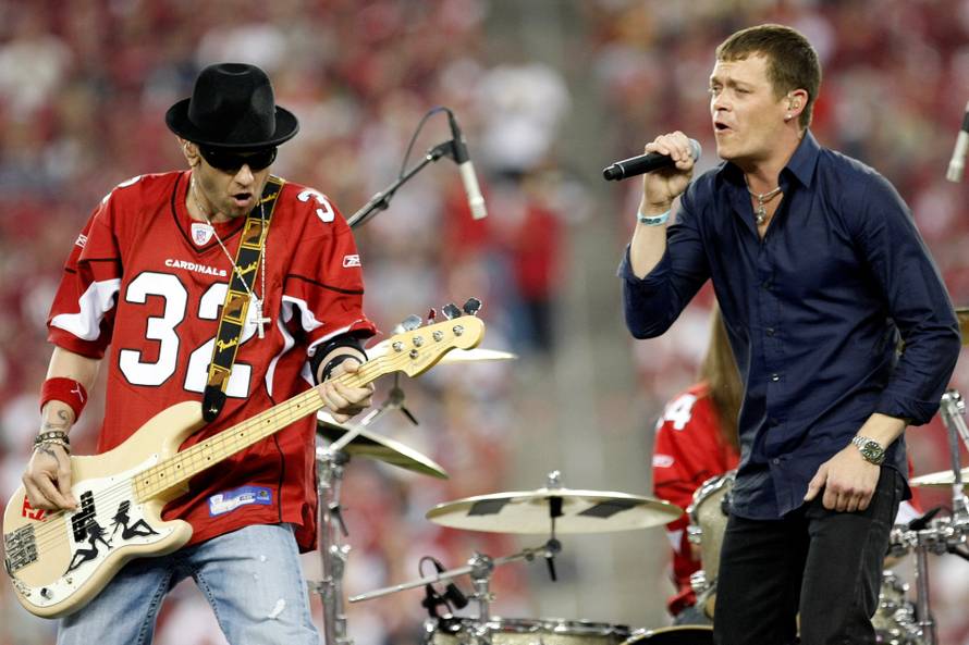 FILE PHOTO: Arnold and Harrell of the rock band "3 Doors Down" perform at halftime during NFL Wild-Card Round playoff football game in Glendale