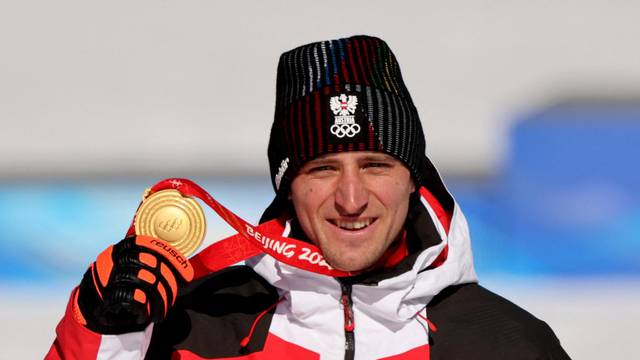 FILE PHOTO: Super-G gold medalist Matthias Mayer of Austria poses with his medal during victory ceremony at 2022 Beijing Olympics