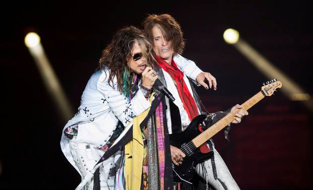 FILE PHOTO: Vocalist Tyler and guitarist Perry of Aerosmith perform during their "Aerosmith: Let Rock Rule" tour at The Forum in Inglewood