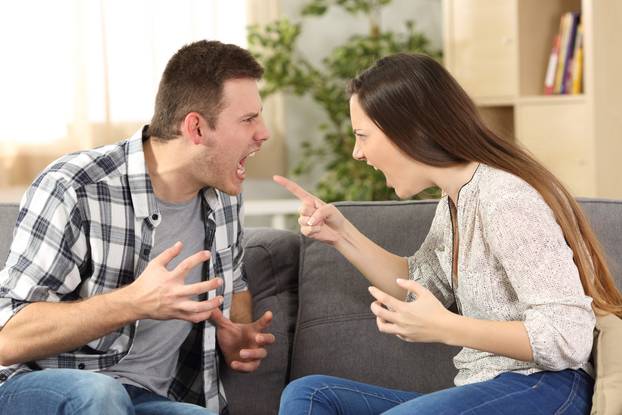 Couple arguing and screaming each other