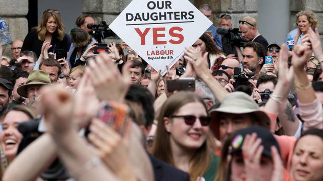 People celebrate the result of yesterday's referendum on liberalizing abortion law, in Dublin