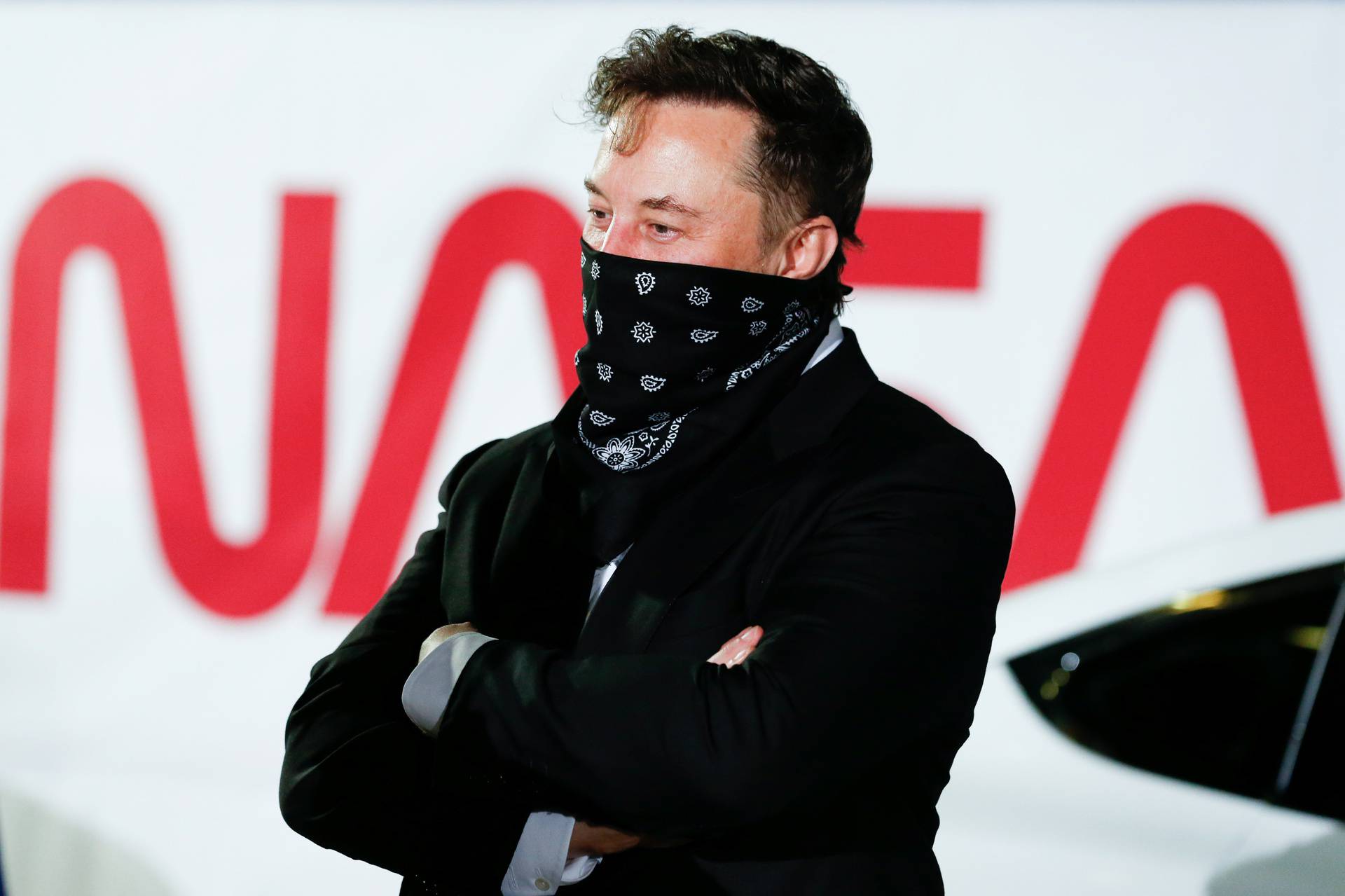 SpaceX founder Elon Musk arrives ahead of the launch of the SpaceX Falcon 9 rocket with the Crew Dragon capsule, in Cape Canaveral