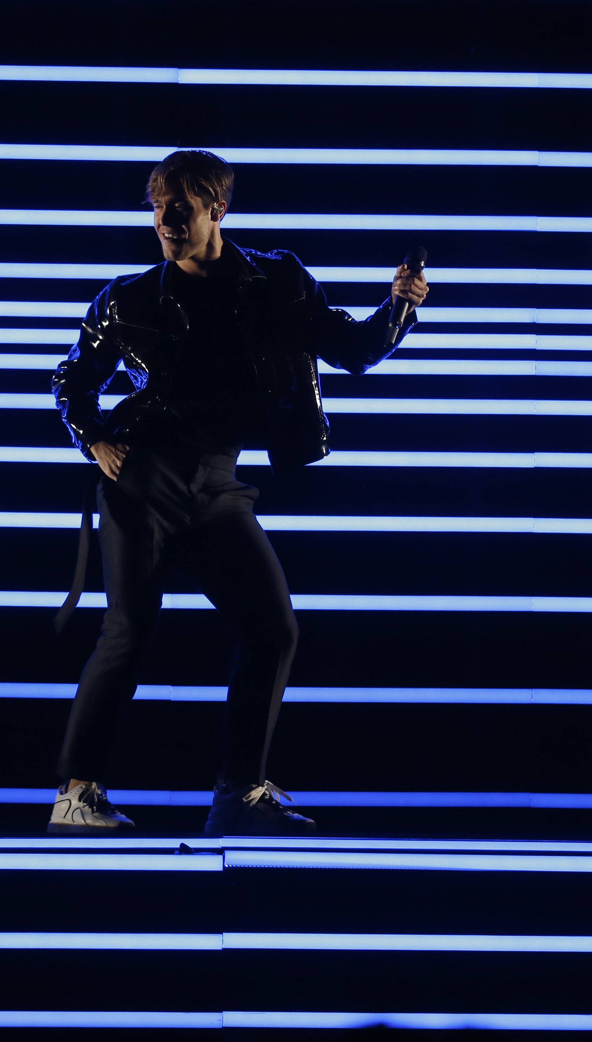 Swedenâs Benjamin Ingrosso performs âDance You Offâ during the Semi-Final 2 for Eurovision Song Contest 2018 in Lisbon