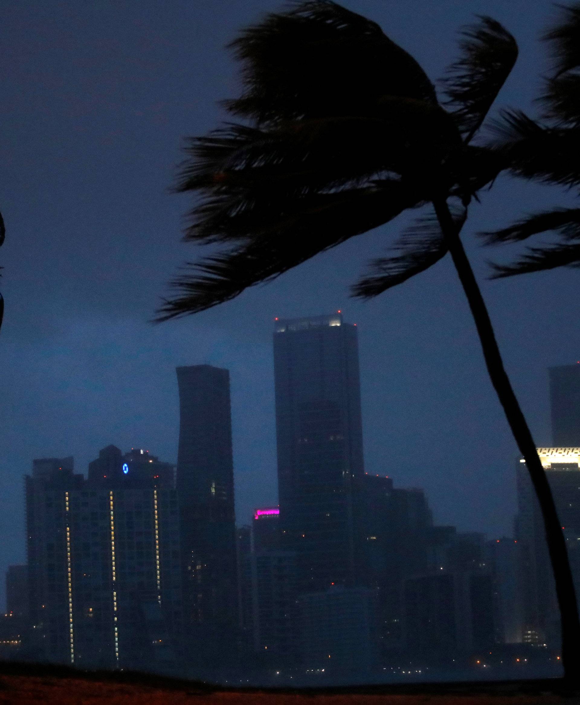 Dark clouds are seen over Miami's skyline before the arrival of Hurricane Irma