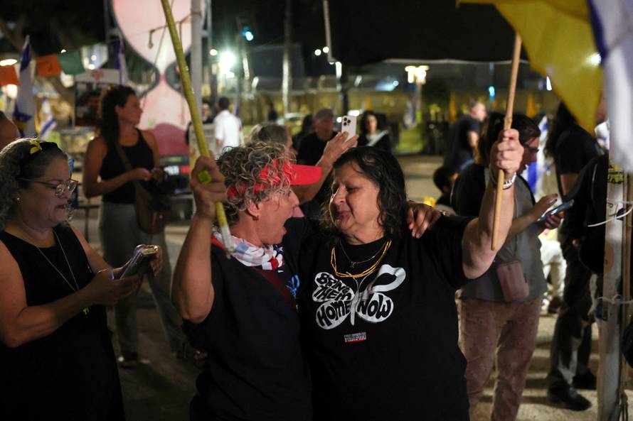 Reactions after Trump announced that Israel and Hamas agreed on the first phase of a Gaza ceasefire, in Tel Aviv