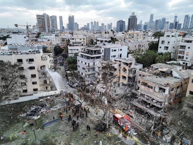A drone photo shows the damage over residential homes at the impact site following missile attack from Iran on Israel, in Tel Aviv