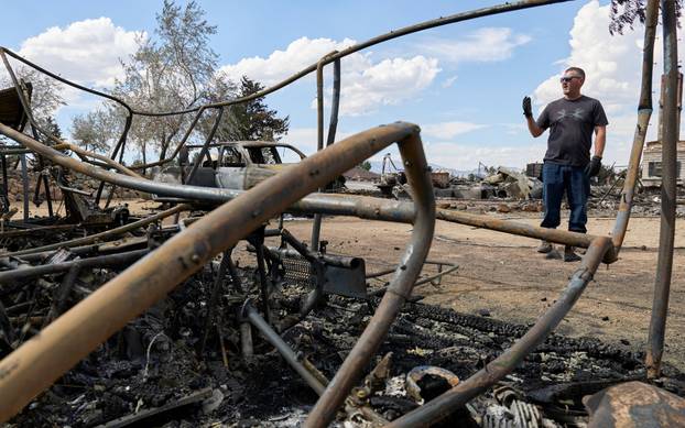 Luke Opperman at his burned home at Hawk Fire in Reno