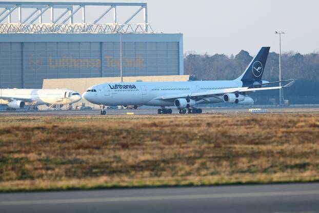 Passengers evacuated from the Middle East arrives from Muscat at the airport in Frankfurt