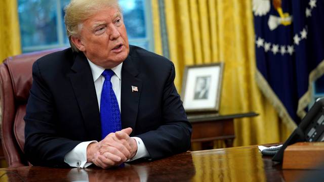 FILE PHOTO: U.S. President Donald Trump sits for interview with Reuters at the White House in Washington