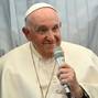 Pope Francis holds a news conference aboard the plane as he returns to the Vatican following his apostolic journey to Hungary