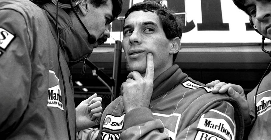 FILE PHOTO: BRAZILIAN RACING DRIVER SENNA TALKS TO MCLAREN TEAM MEMBER DURING FINAL PRACTICE SESSION FOR JAPANESE ...