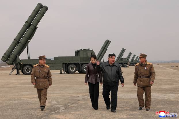 North Korean leader Kim oversees test-launch of multiple rocket launchers