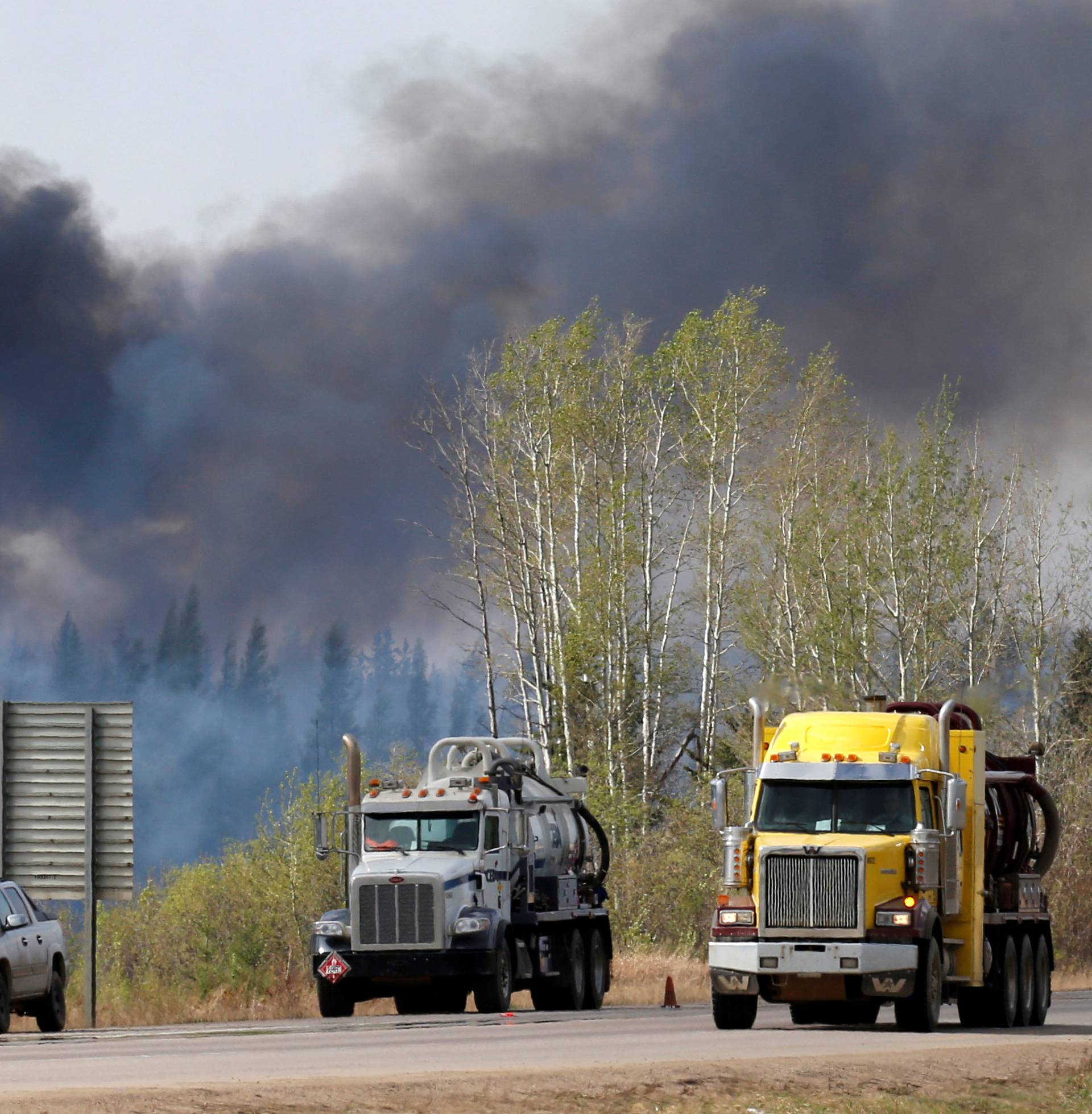 A wildfire burns near Highway 63 south of Fort McMurray