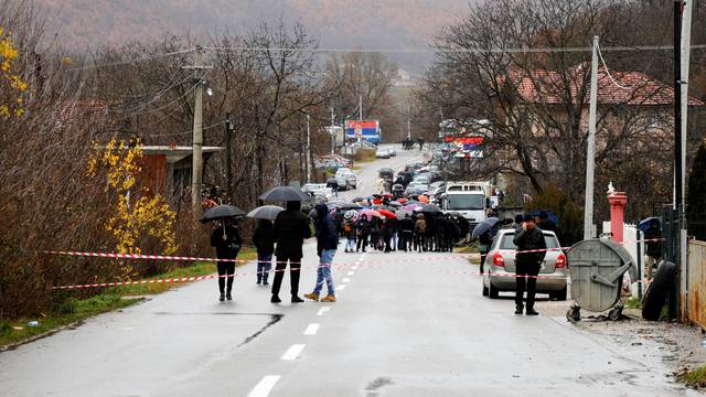 Kosovo Serbs block the road near the village of Rudine