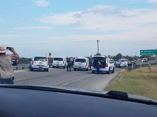 Police cars are seen at Sutherland Springs