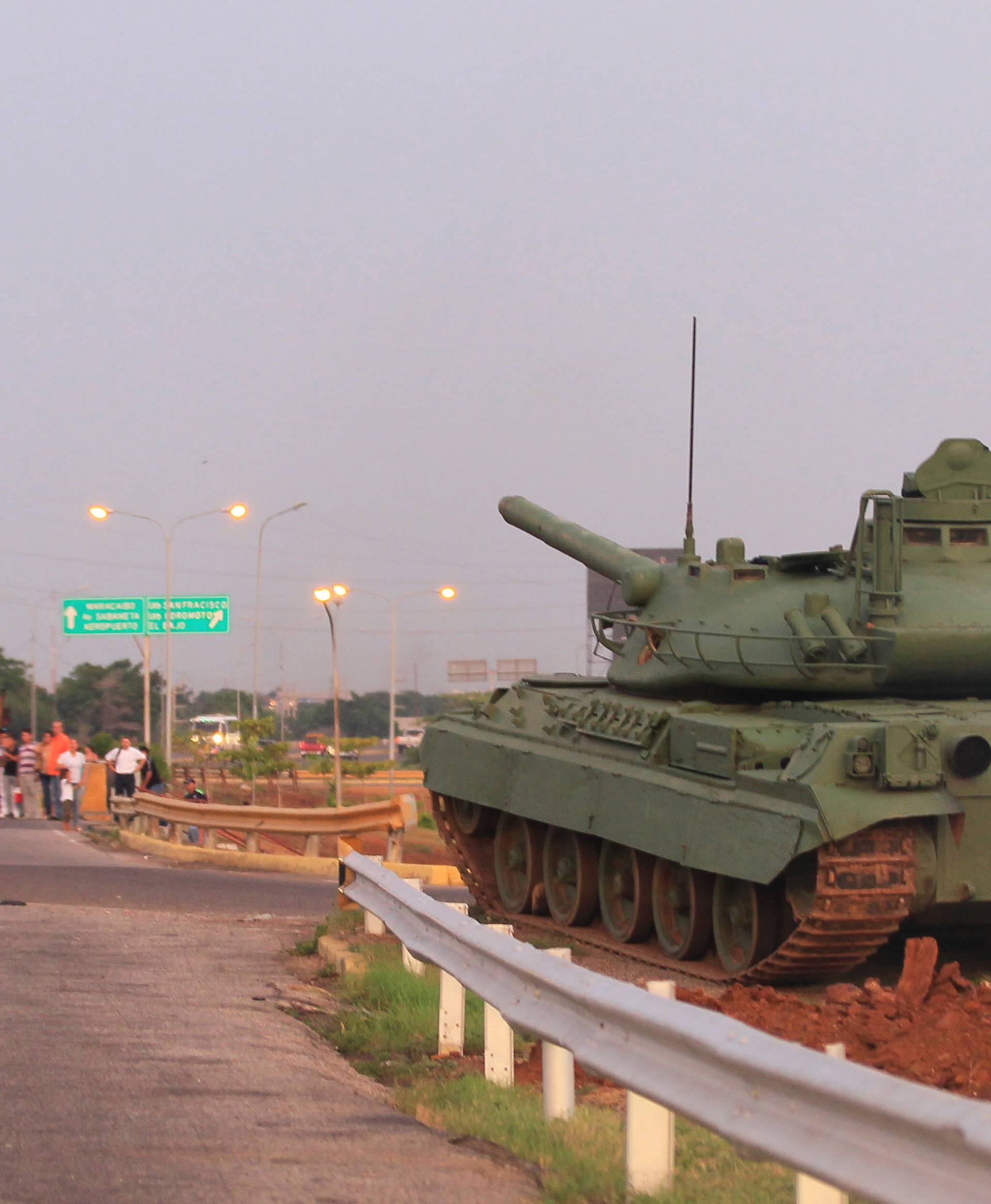 Military tank is seen along highway as part of military exercises, in Maracaibo