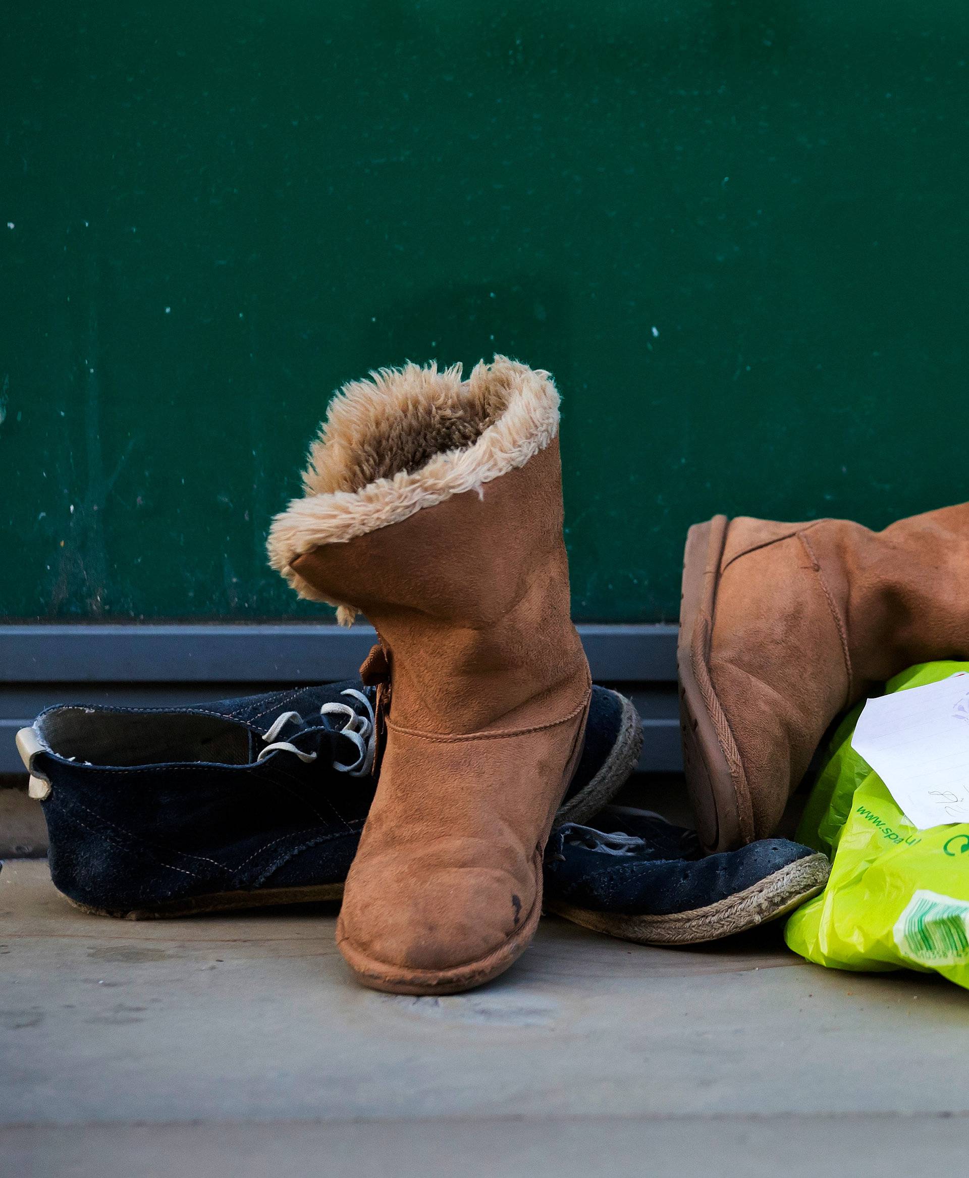 Shoes and personal belongings are seen near the Manchester Arena in central Manchester, Britain