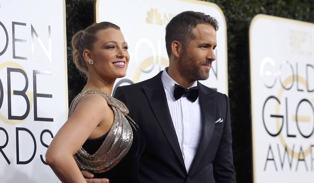 Actors Reynolds and Lively arrive at the 74th Annual Golden Globe Awards in Beverly Hills