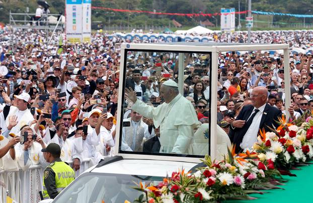 Pope Francis arrives on the popemobile for a holy mass at Enrique Olaya Herrera airport in Medellin