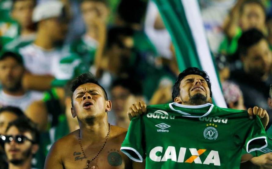 Fans of Chapecoense soccer team pay tribute to Chapecoense's players at the Arena Conda stadium in Chapeco